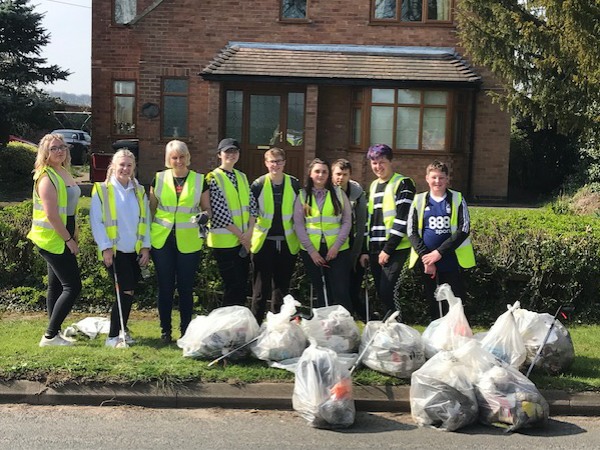McDonalds employees with litter collected on the Moorlands